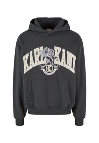 Sweat à capuche noir avec grand texte crème "KARL KANI", illustration de fleurs et emblème "EST. 1989" sur le devant, avec poche kangourou.
