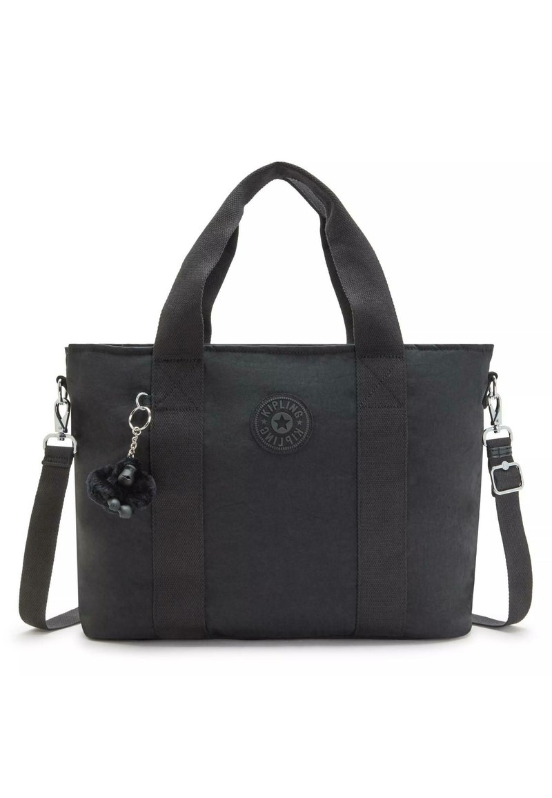 Black tote bag made of durable fabric, featuring two top handles, a removable shoulder strap, and a plush monkey keychain accent.