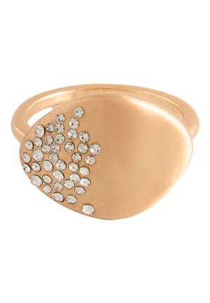 Gold-tone ring with an oval top featuring a cluster of small clear rhinestones on one side against a white background.