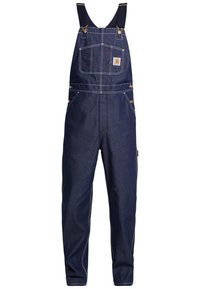 Laivastonsiniset farkkuhaalarit, joissa säädettävät olkaimet, rintatasku edessä ja kaksi sivutaskua, valkoisilla kontrastisomisteilla.