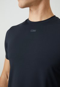 ICANIWILL MIRAGE MEN - T-skjorte til trening - black