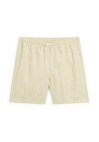 Pantaloncini da mare beige chiaro con un motivo astratto ondulato, vita elastica e chiusura con cordoncino. Realizzati in tessuto morbido e traspirante.