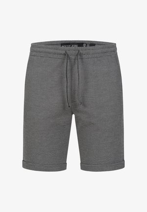Shorts en tricot gris avec une finition texturée, taille à cordon de serrage et ourlets retroussés. Comprend une étiquette de marque sur la ceinture.