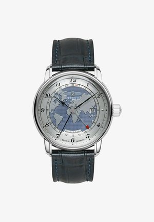 Silver-tone watch with a blue world map dial, Arabic numerals, and a black leather strap with blue stitching. Features a date display and GMT function.