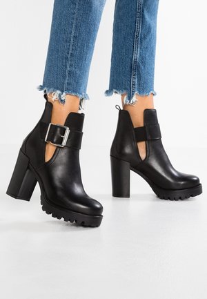 Bottines à talons hauts - black