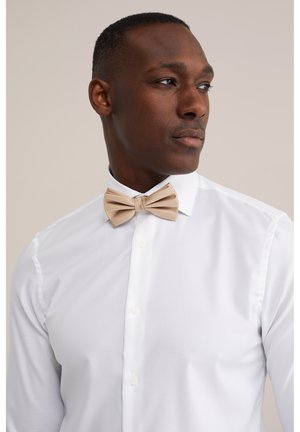 WE Fashion Kikilips - beige