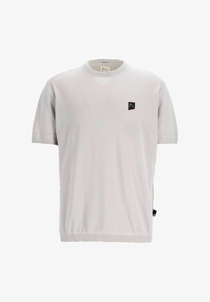 Harmaa lyhythihainen t-paita, joka on valmistettu pehmeästä puuvillasta. Siinä on pieni musta logo vasemmassa rinnassa ja huomaamaton sivulappu.