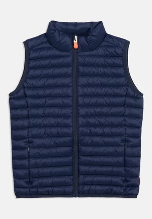 Gilet smanicato trapuntato blu navy con collo alto, cerniera frontale e tasche laterali. Leggero e imbottito per mantenere il calore.