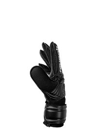 Gant de gardien de but noir avec paume texturée, rembourrage protecteur et sangle au poignet, présenté ouvert avec les doigts écartés.