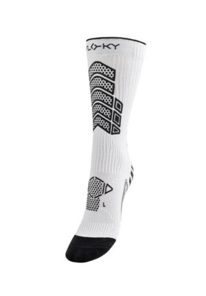 Calzino sportivo bianco con motivi geometrici antiscivolo neri e punta rinforzata nera, progettato per supporto e prestazioni antiscivolo.