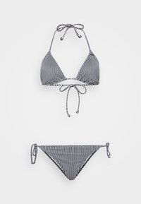 Stripet bikiniset med halterneck-top som har justerbare bånd, og matchende bunn med sidebånd, i svart og hvit farge.
