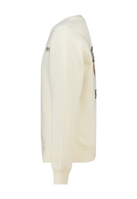 Sweat-shirt couleur crème avec un col rond, manches longues et poignets côtelés ; présente un texte imprimé sur le devant et un logo sur la manche.