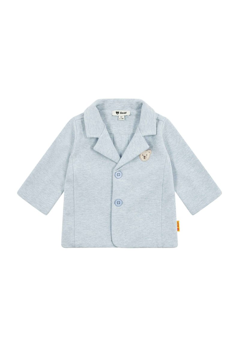 Blazer in cotone azzurro chiaro con colletto a punte, due bottoni frontali e una toppa di orsacchiotto sul lato sinistro. Maniche lunghe.