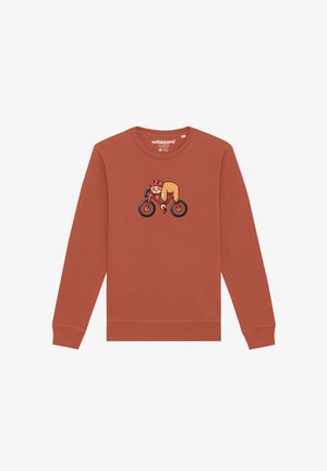 Sweat-shirt couleur rouille en coton, arborant un graphique de cycliste en cartoon sur le devant. Conception à manches longues et col rond.