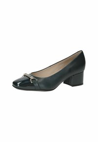 Zapatos de charol verde oscuro con tacón bajo tipo bloque. Presentan una puntera redondeada y un herraje metálico decorativo en la parte delantera.