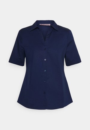 Blouse bleu marine à manches courtes avec col, fermeture à boutons sur le devant et légère évasement à la taille.
