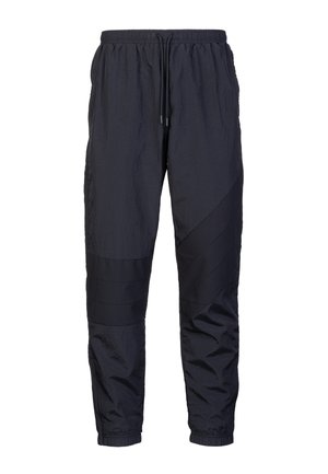 Pantaloni jogger leggeri di colore blu navy con vita elastica, cordoncino e pannelli testurizzati lungo i lati. Caviglie con polsino fitted.