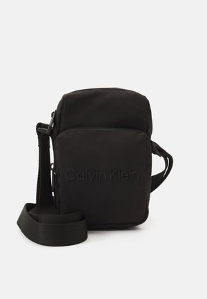 MUST REPORTER XS UNISEX - Geantă crossbody - black