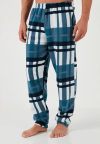Fleece-Plaid-Pyjama-Hosen in Teal, Marineblau und Weiß. Mit elastischem Bund und seitlichen Taschen; moderner Schnitt mit schmal zulaufenden Beinen.