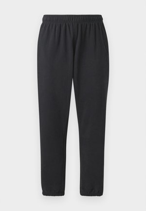 Fekete sportnadrág puha anyagból, rugalmas derékkal, oldalsó zsebekkel és szűkített lábakkal, bordás szegéllyel.