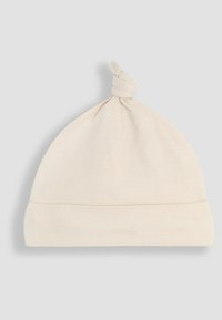 Gorro de bebé de algodón ligero en crema con un nudo en la parte superior. Presenta una textura suave y un dobladillo plegable en la base para un ajuste ajustable.
