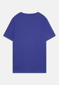 Purple short-sleeve t-shirt featuring a round neckline, smooth texture, and clean stitching. Back view shows solid color, no patterns or graphics.