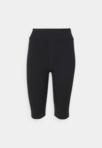 Leggings capri noirs avec une taille haute. Texture lisse, construction sans couture et détail de logo discret à l'ourlet.
