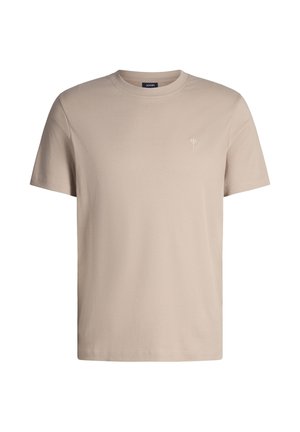 T-shirt en coton beige avec un col rond et des manches courtes. Logo brodé subtil sur la poitrine gauche. Texture douce, design minimaliste.