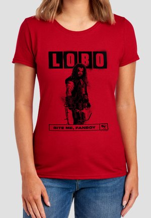 Person wearing a red T-shirt with black graphic of a muscular character holding a hammer, text reads "LOBO" and "BITE ME, FANBOY."