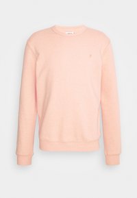 Sudadera rosa hecha de un tejido suave, con cuello redondo, mangas largas y puños acanalados, y con un pequeño logo en el pecho.