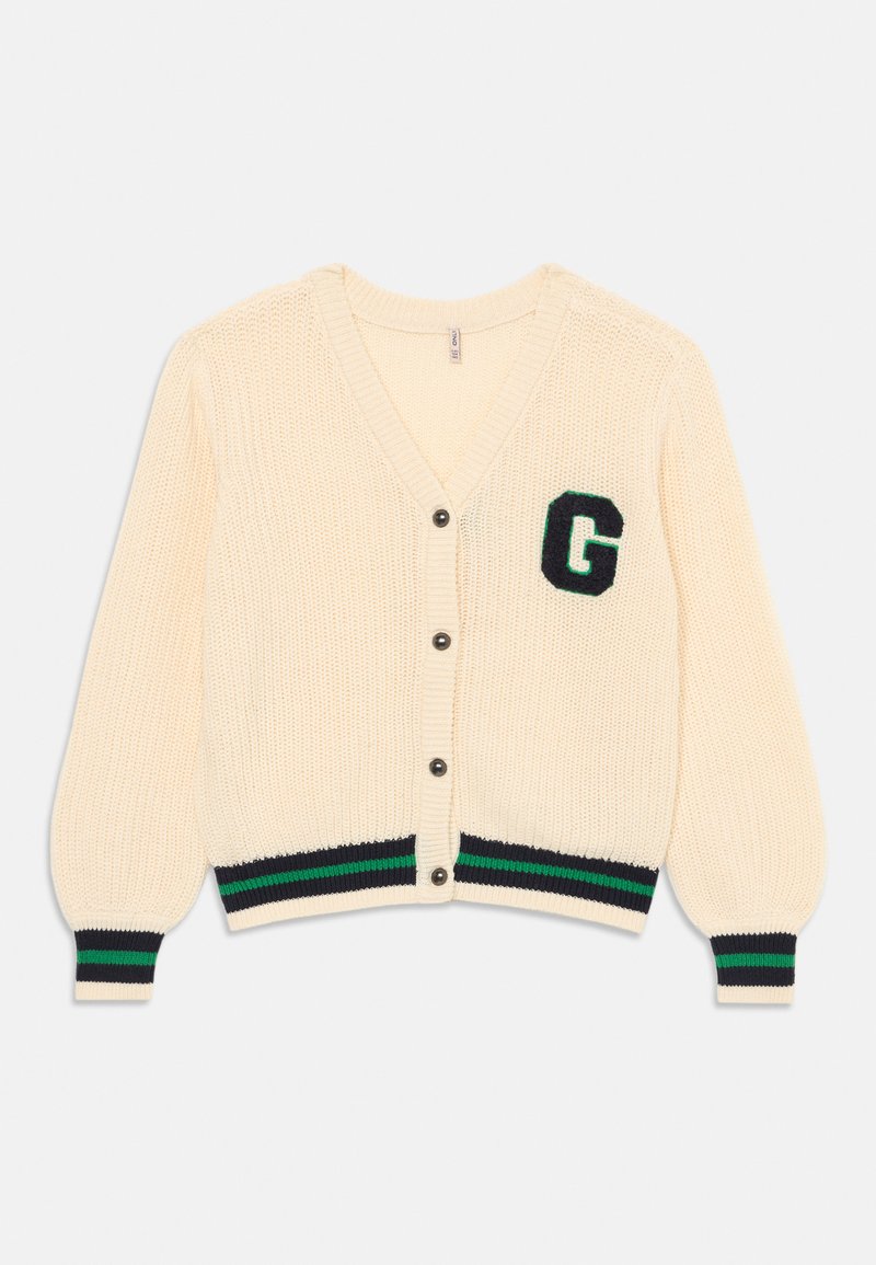 Krämfärgad stickad cardigan, V-ringning, knappar framtill, har en svart "G"-dekal, ribbade muddar och fåll med gröna och marinblå ränder.