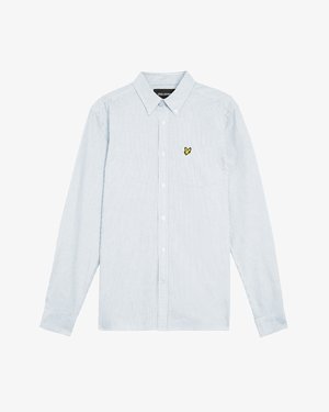 Svītraina krekla stila krekls gaiši zilā un baltā krāsā ar nelielu dzeltenu logotipu uz krūšu kabatas. Izgatavots no faktūras kokvilnas auduma.