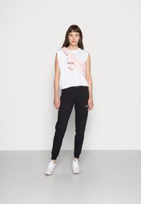 Nike Sportswear PANT TIGHT  - Jogginghose - black/white
