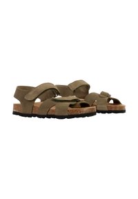 Brune ruskinds sandaler til børn med justerbare velcro-remme og korksåler, vist på hvid baggrund.