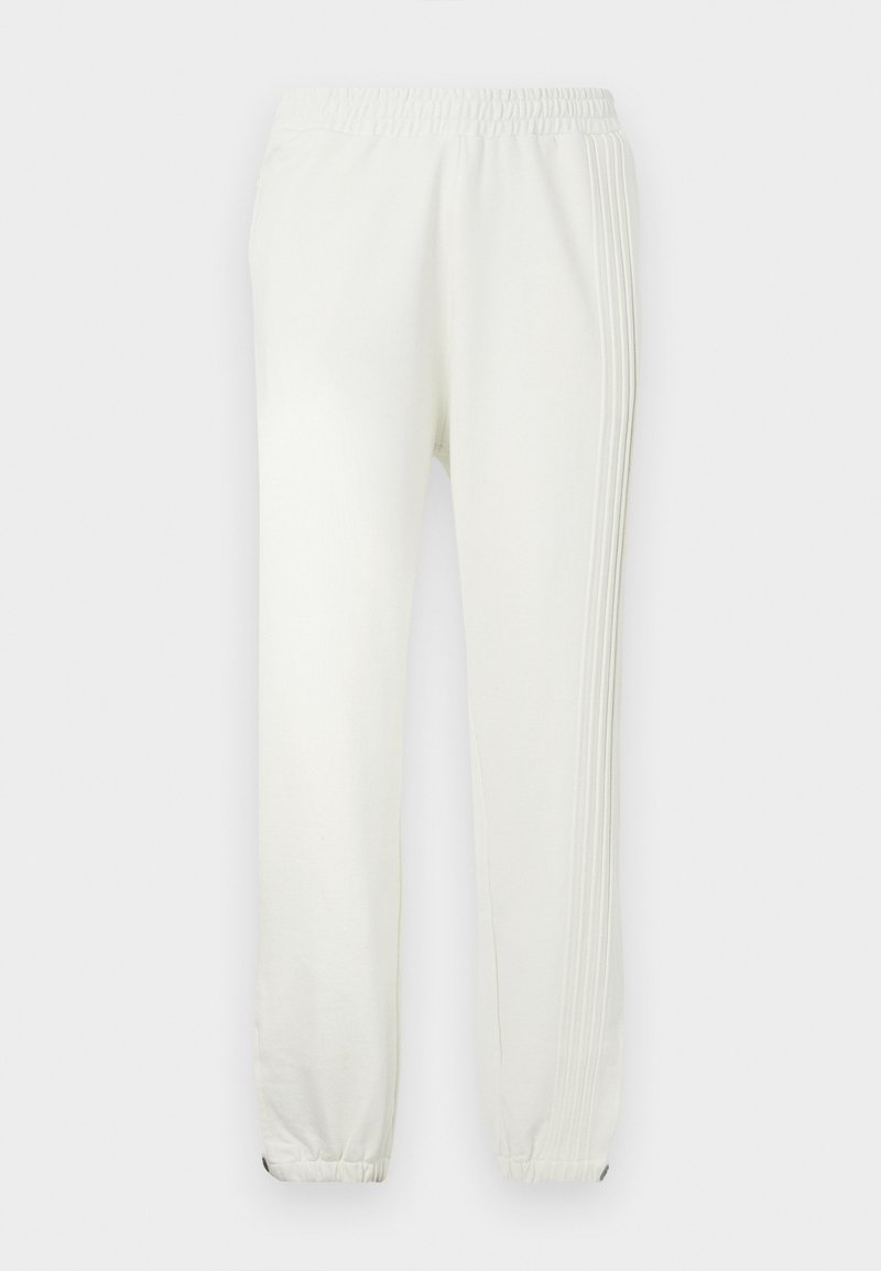 Carlo Colucci THE CAPSULE - Tracksuit bottoms - off white/off-white ...