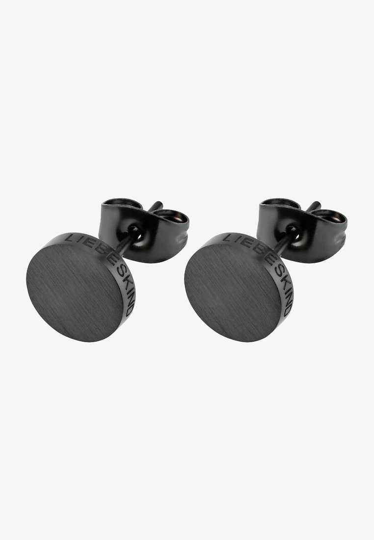 Gemelli in metallo nero con una forma liscia e rotonda e una finitura spazzolata. Incisi con "LIEBESKIND" sul bordo. Chiusura posteriore sicura.