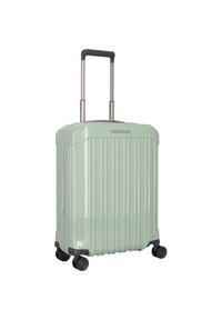 Valigia rigida di colore verde chiaro con design a coste verticali, manico estensibile, quattro ruote nere e finitura liscia e lucida.