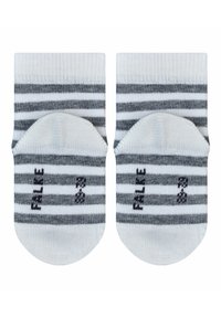 Striped ankle socks in white and gray, featuring horizontal stripes and a rounded toe. Small black text accents near the base.