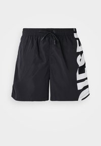 Black swim shorts with an elastic waistband and drawstring. Features bold white lettering on the side. Made of smooth, lightweight fabric.