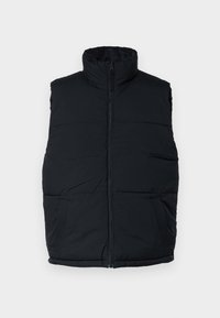 Chaleco acolchado sin mangas negro con cuello alto, cremallera delantera y dos bolsillos laterales. Fabricado con tejido acolchado de textura suave.