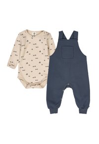 Beige long-sleeve bodysuit with a vehicle pattern, paired with navy blue overalls featuring adjustable straps and a front pocket.