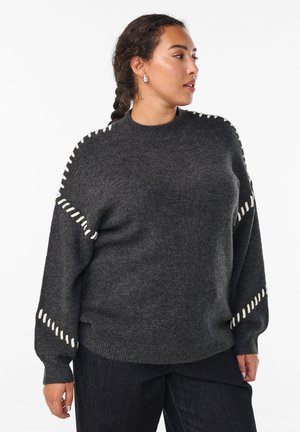 - Sweter