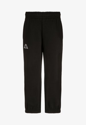 Pantalon de sport noir avec taille élastique, jambes fuselées et poignets élastiques. Comprend un petit logo blanc sur la partie supérieure de la jambe gauche.