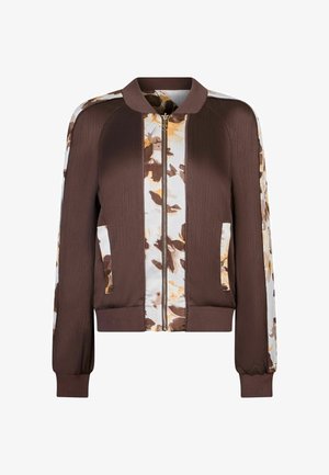 Brūna zip-up bomber jaka ar baltām un brūnām ziedu raksta panelēm priekšpusē, piedurknēs un kabatās, ar ribotu aproci un apkakli.