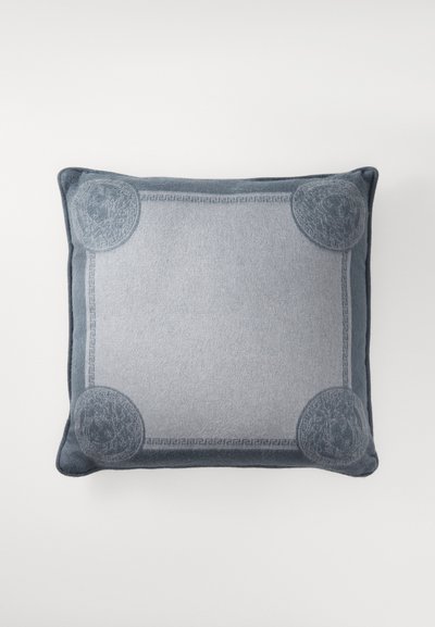 Square cushion in two shades of blue, featuring textured round accents at corners and a decorative border pattern. Soft fabric finish.
