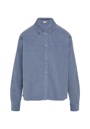 Light blue corduroy shirt with a classic collar, button-up front, long sleeves, and a slightly relaxed fit. Textured fabric with visible stitching.