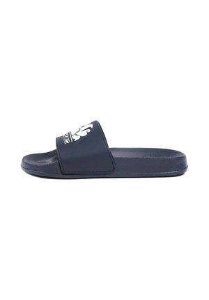 Infradito blu navy con una fascia testurizzata e un design del logo bianco, suola piatta e punta arrotondata. Realizzato in materiale sintetico.