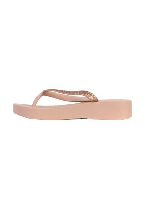 Infradito rosa chiaro con una base liscia e ampia e sottili cinghie glitterate, caratterizzate da un tacco leggermente rialzato e una suola piatta in gomma.