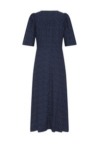 Midi šaty námorníckej modrej farby s krátkymi rukávmi a bielymi bodkami, priliehavý pás a mierne rozšírená sukňa, zobrazené zozadu.