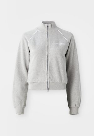 Hallikate zip-up fliis kõrge kraega, ribitud mansettide ja äärega, koos valgete detailide ja rinnal oleva logoga. Pehme kangastekstuuri.